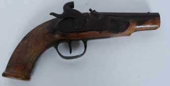 An 18th / 19th century percussion pistol having a shortened barrel and no visible makers marks.