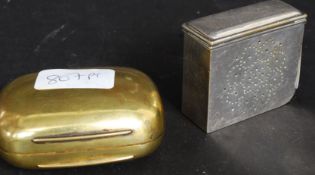 A late Georgian gilt metal soap box bearing coat of arms crest to the top together with a silver