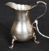 A late Victorian silver hallmarked creamer by Stokes & Ireland Ltd -William Henry Stokes & Arthur
