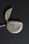 A silver hallmarked circular vesta with central monogram. Chester hallmarks for S.