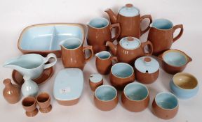 A Denby Langley part dinner / tea service comprising teapots, coffee pots, bowls, serving dish,