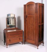 A 1930's Art Deco oak cottage dressing table chest of drawers together with a matching single