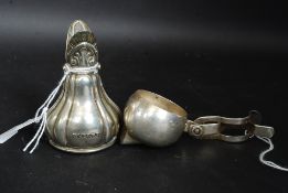 A very unusual white metal patent device