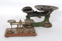A good pair of mahogany and brass postal