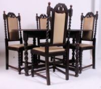 An Edwardian oak barleytwist oval dining