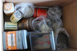 A group of vintage tins of various names