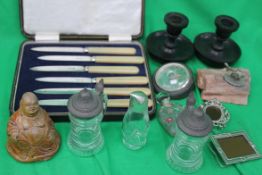 An assortment to include ebonised candle