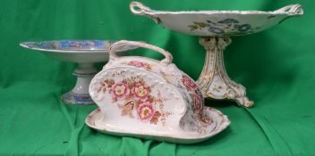 Two floral patterned cake stands along w