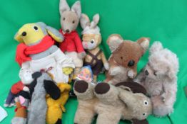 A group of 12 vintage teddy bears and pu