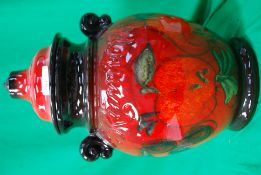 A West German Rumtopf pot with red apple