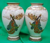 A pair of Japanese Oriental vases depict