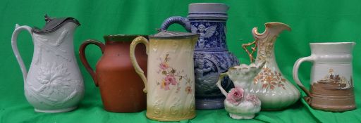 A good group of well styled jugs to incl