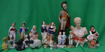 A group of porcelain figurines to includ