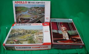 Three vintage large puzzles , one being