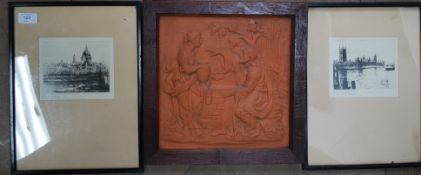 A framed tile artwork of peasants at a w