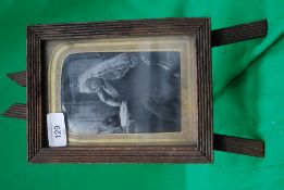 A framed picture of Queen Victoria mount