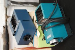 Two vintage slide projectors one in orig