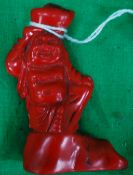 A Chinese red coral carved figure of Hot