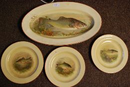A group of 4 Hurrley ware fish plates ,