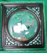 An Oriental style painting on glass of b