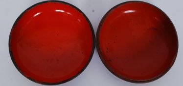 A decorative papier mache large wooden handpainted box of circular form having scene of farmer and