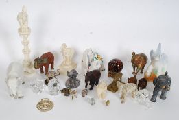 A large collection of ornamental Elephants of various designs and styles