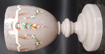 A hand painted Opaline vase.