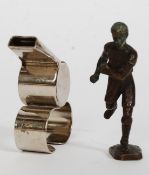 A small bronze cast figure of an early 20th century footballer along with a mid century Acme