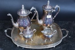 A silver plated tea service comprising of coffee pot, tea pot, sugar bowl, tray and milk jug.