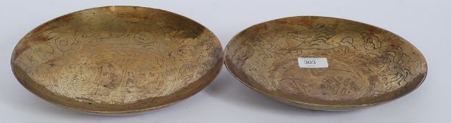 A pair of believed Chinese prisoner of war engraved brass plates / bowls,