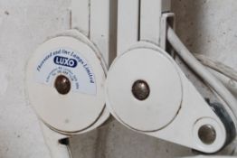 A pair of large contempory vintage style wall mounted anglepoise lamps by Luxo- both in white