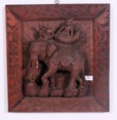 A large heavy vintage carved Thai wooden panel.