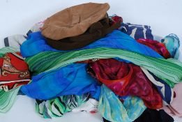 A good collection of ladies silk scarves along with two vintage hats to include a Kangol