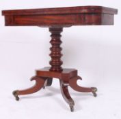 A 19th Century Regency flame mahogany card table.