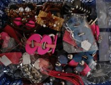 A good box of costume jewellery to include many new items still in the packaging having beads, wood,