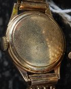 A stunning 9ct gold ladies Omega dress watch complete with the original full 9ct gold bracelet