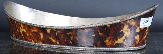 A large silver plated and faux tortoiseshell serving dish.