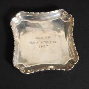 A silver hallmarked pin tray having incised notation for Boxing R.M.A. & Belsize 1937.