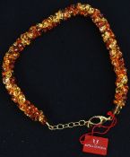 A cased ladies Antica Murrina glass beads necklace having yellow metal chain with box and labels