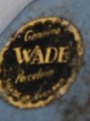 A Wade novelty Seal corkscrew figure balancing a ball along with a Shamrock pottery figure of a
