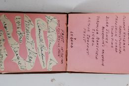A vintage autograph book featuring the autographs from the show ' Radio Times ' including Larry
