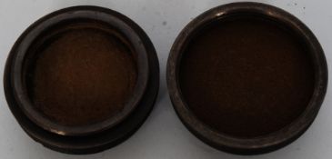 A bronze box with Nazi German swastika.