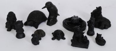 A collection of coal figurines