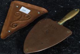 An unusual Arts & Crafts Irish copper trivet stand and tray being marked for 1914.