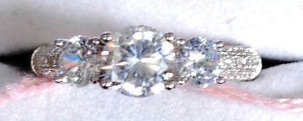 A 925 white metal ( silver ) and CZ  set ladies ring.