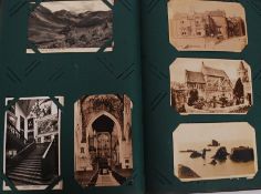 A good early postcard album with cards from the early to mid 20th century mainly.