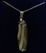 A silver white metal and marble drop pendant necklace.