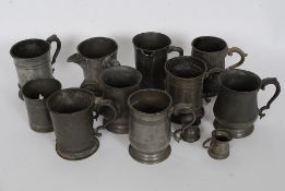 A collection of 19th century and possibly later pewter tankards to include Yates & Birch,