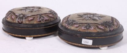 A pair of early 19th century Georgian footstools,