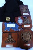 A collection of International Police Association wooden plaques to include Royal Canadian Mountain